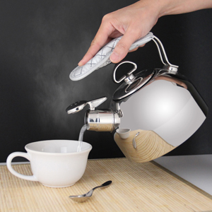 classic stainless steel teakettle 1.8 quart capacity original iconic design the only teakettle in the market to feature a two-tone Hohner harmonica whistle in action